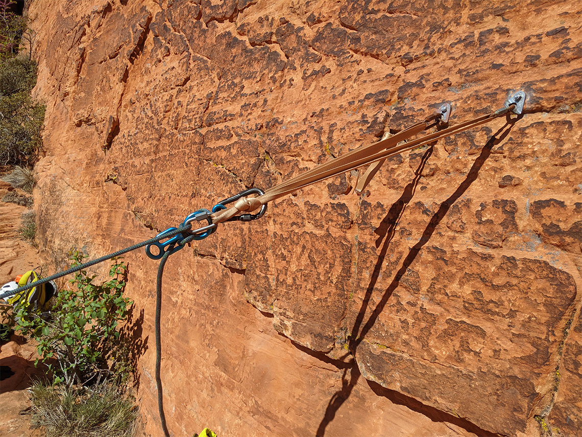 Bolted anchor on first rappel in Pictograph Canyon