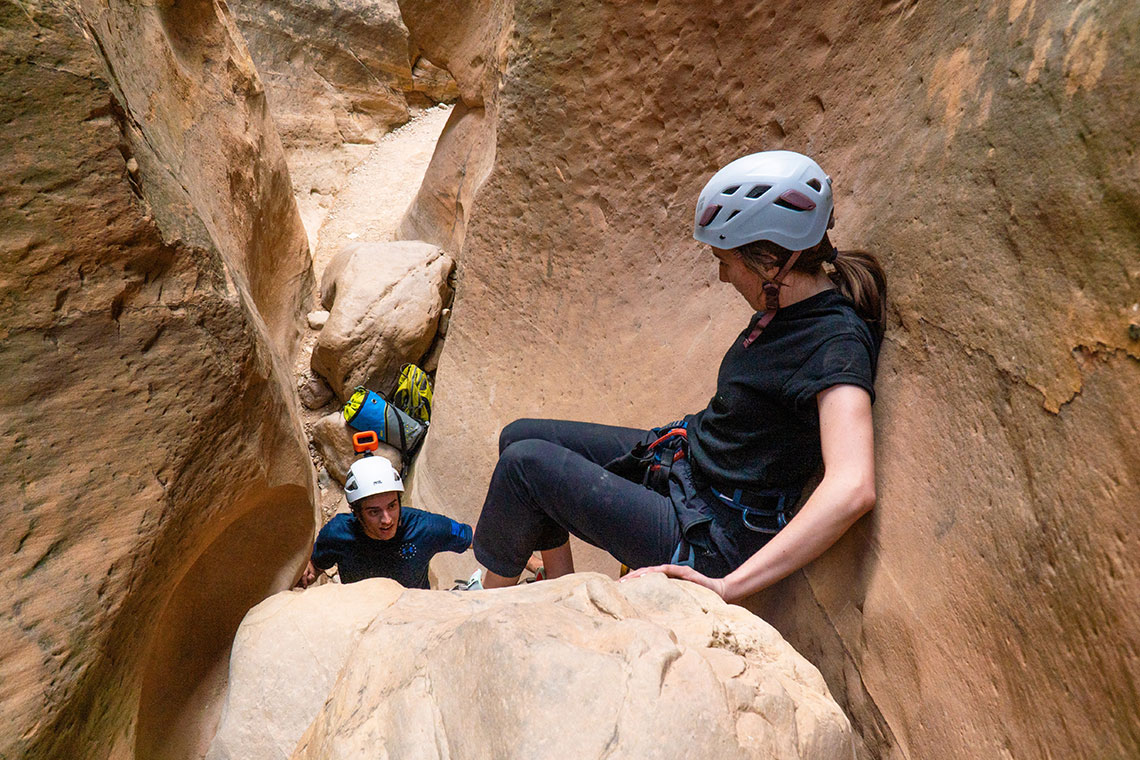 Downclimbing using a partner assist