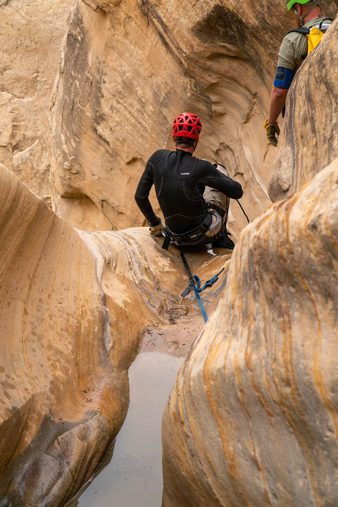 Going over the edge of rappel 3 in Wonderland Canyon