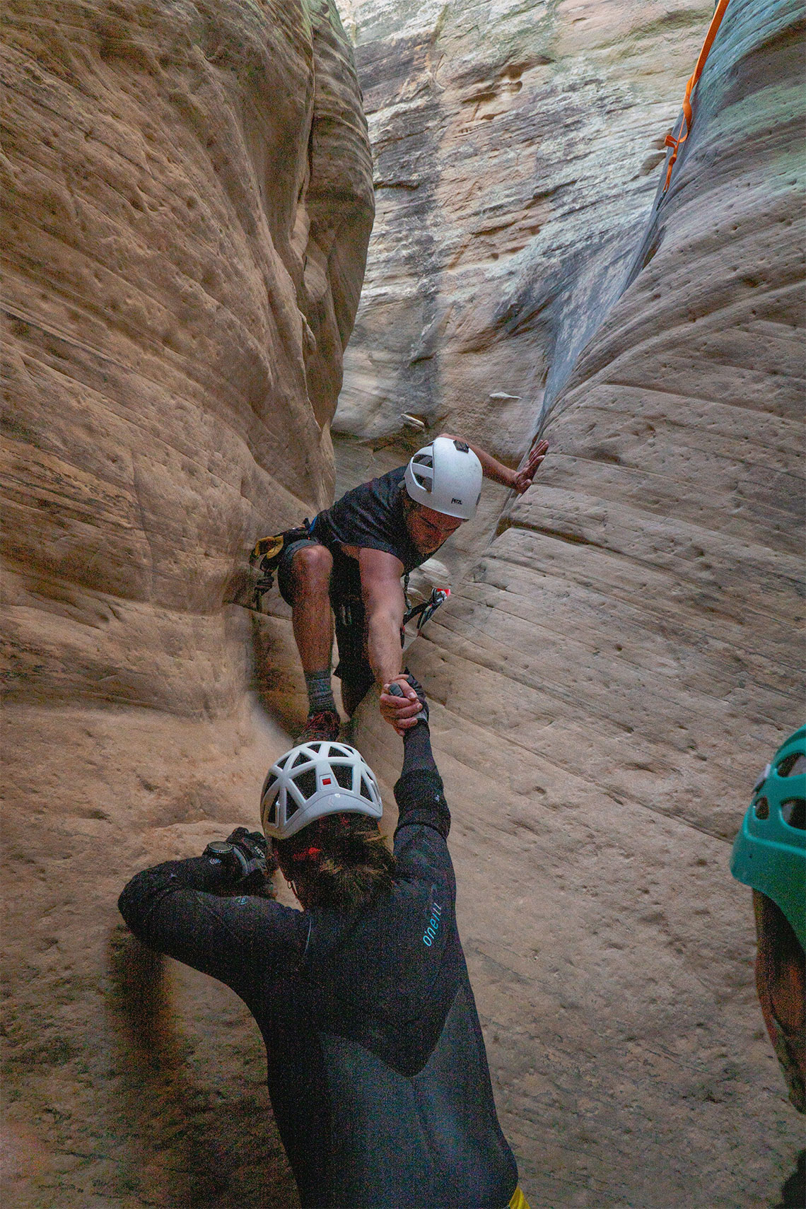 Lifting someone out of the semi-keeper pothole in Wonderland Canyon