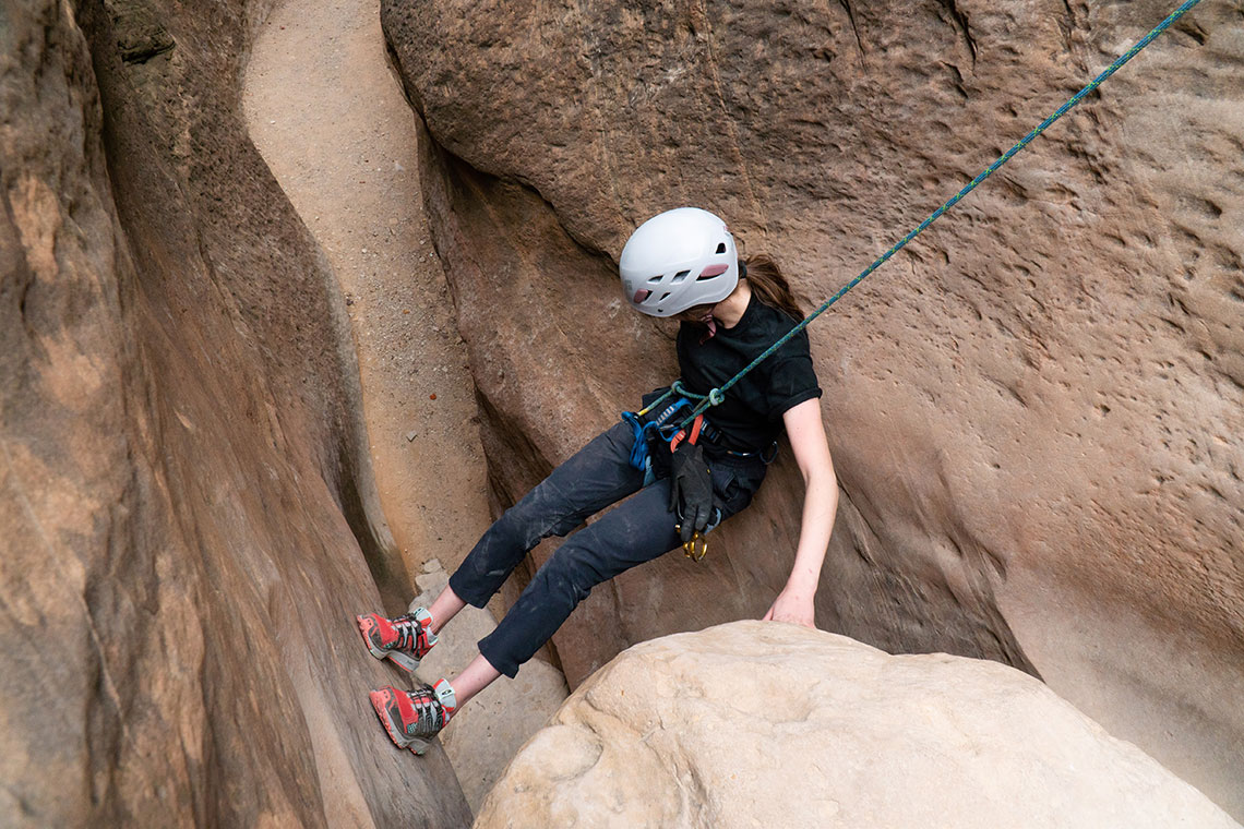 Downclimbing with a belay in Yankee Doodle Canyon