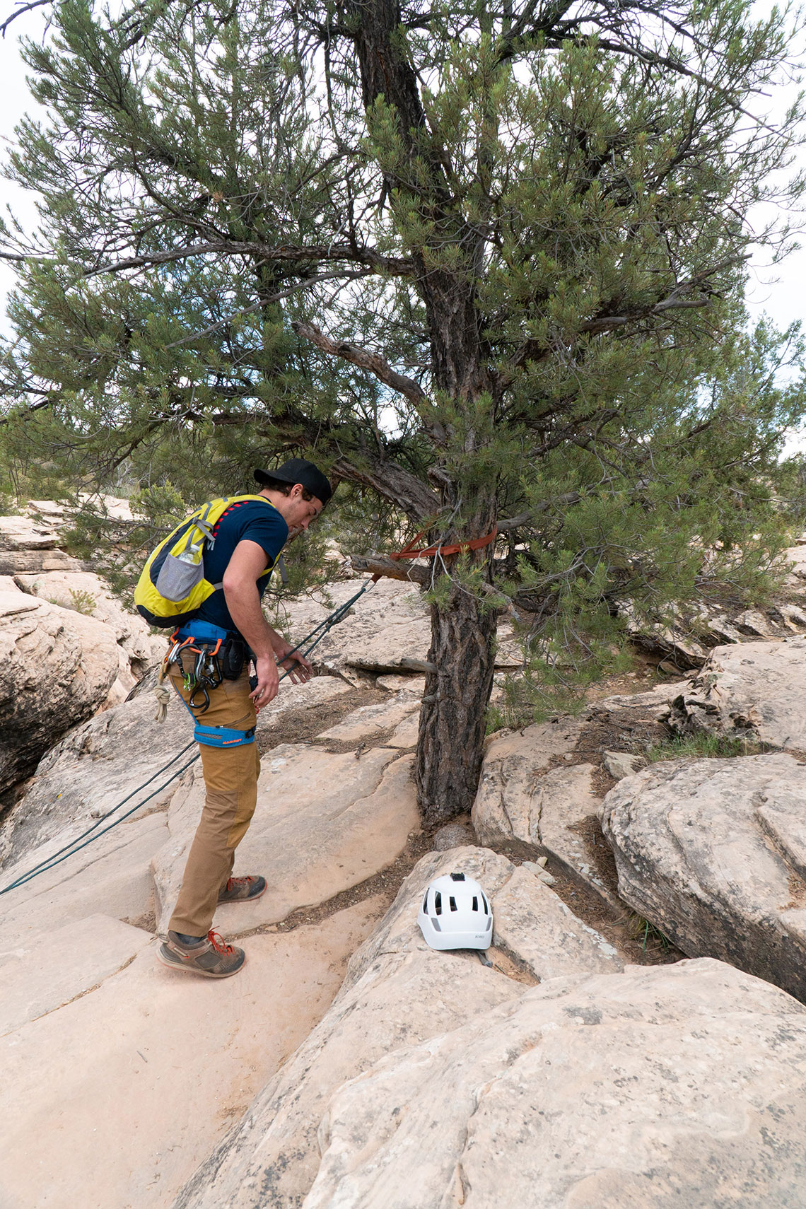 Checking the anchor at rappel 1 in Yankee Doodle Canyon