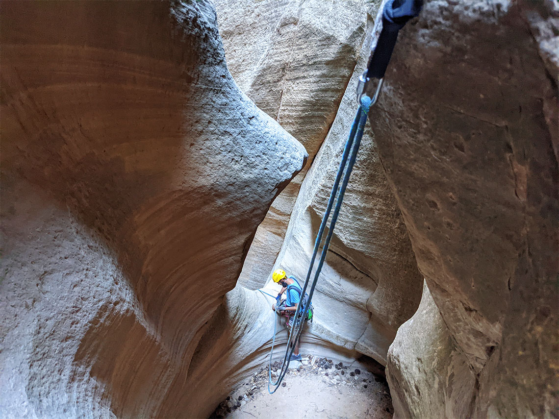 Peeking over the edge of rappel 4 in Englestead