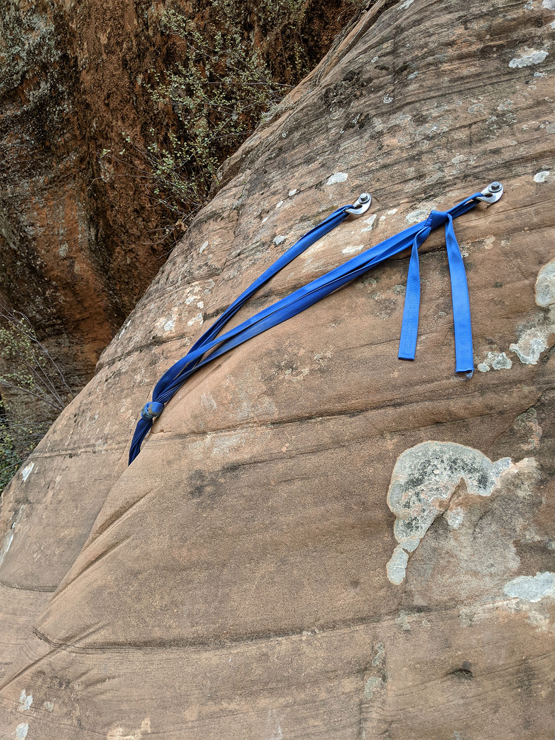 The anchor for the 7th rappel in Behunin