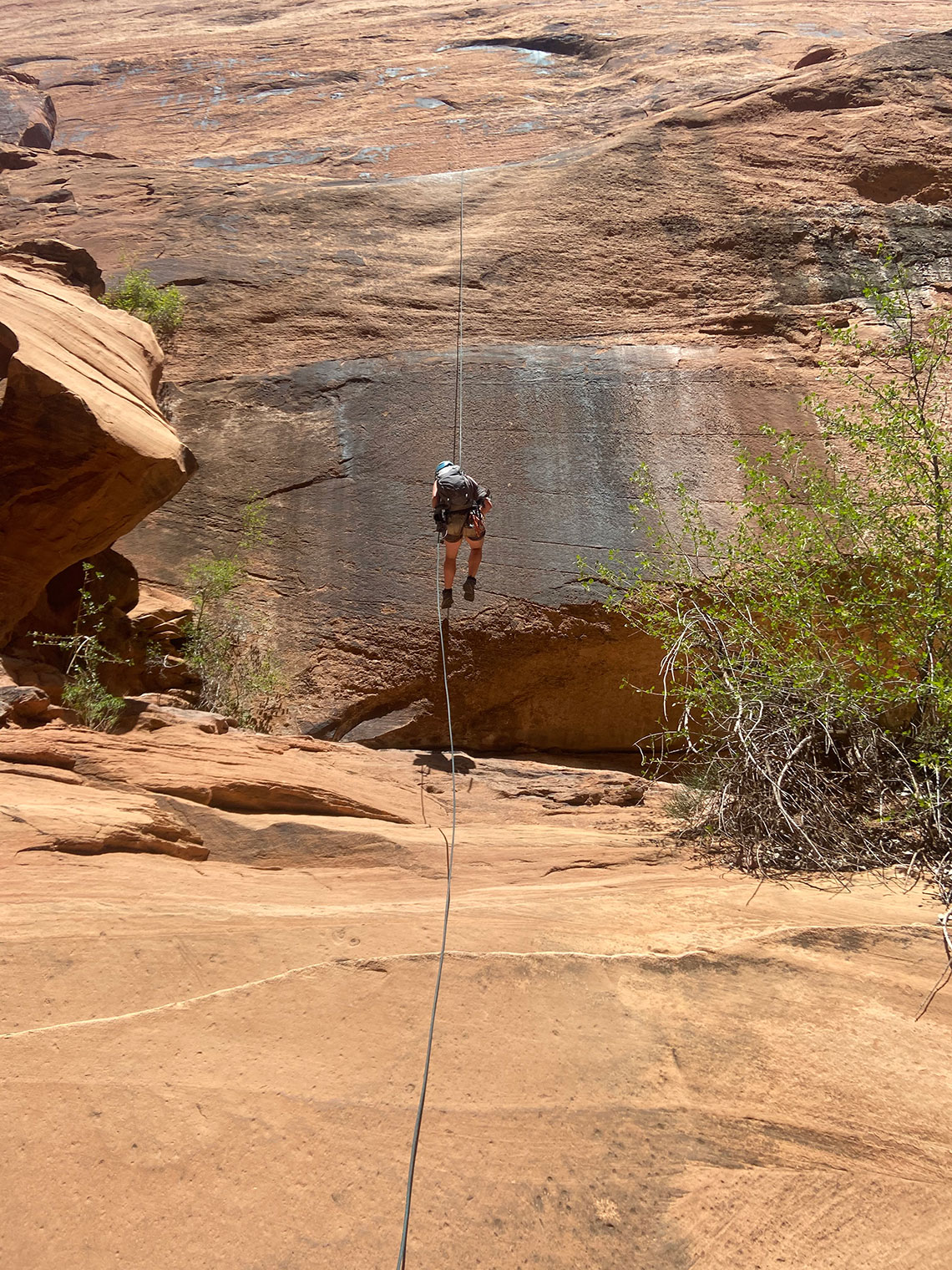 Rappelling down the 2nd rappel in Pool Arch Canyon