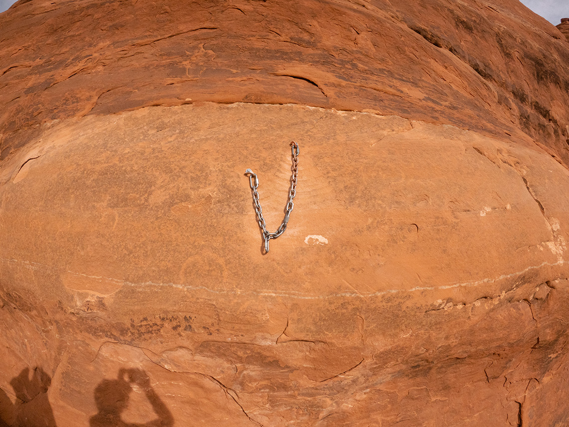 Some nice bolts and chains as the anchor for Elephant Butte's first rappel