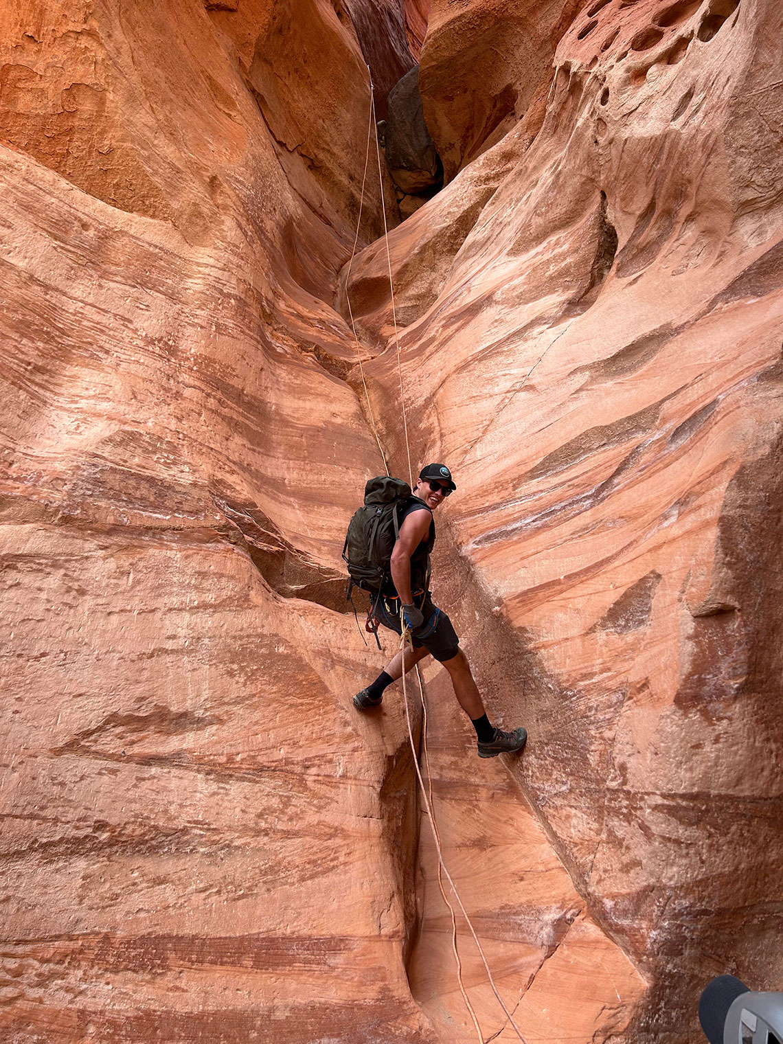 Looking up from the bottom of rappel 4 in Sunglow Canyon